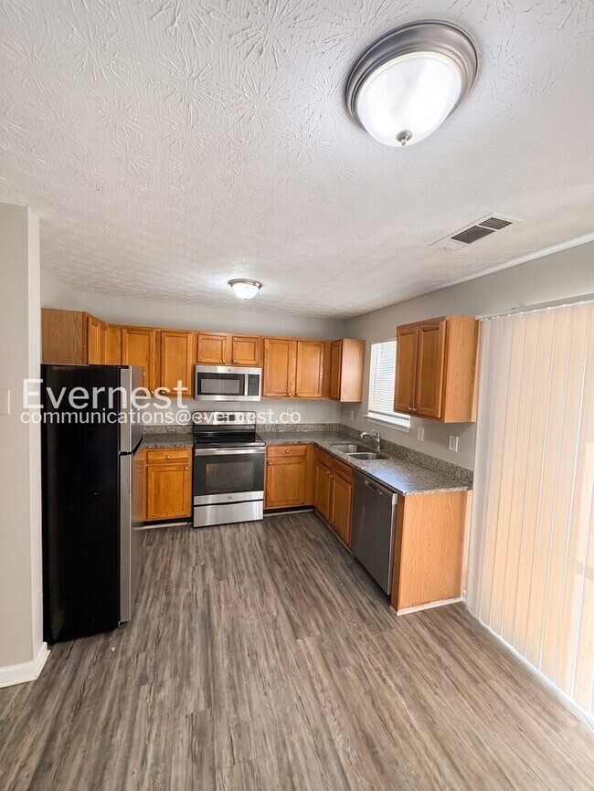 Photo - Charming 4-Bedroom Home with Modern Comforts / Pet-Friendly / Vouchers Accepted / Available Now!