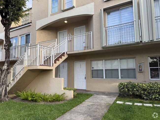 Building Photo - 8670 NW 6th Ln Unit 4-103 Rental