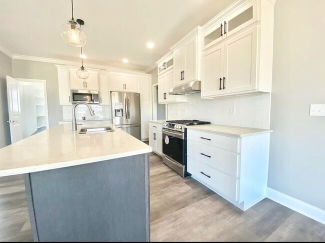 Photo - 4 Bed 2 bath with 3 car attached garage