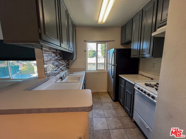 Photo - 17900 Sherman Way Unit 320