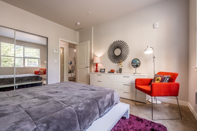Bedroom with Mirrored Closet Doors