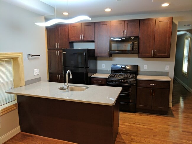 Building Photo - 3221 Guilford Ave Unit C