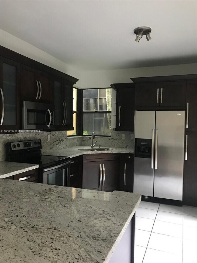 15563 N Miami Lakeway Condo Unit 10717 Condo for Rent in Miami Lakes