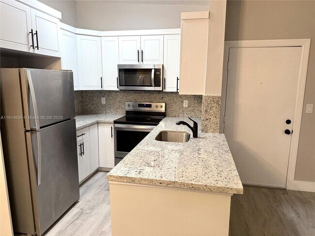 Photo - 9719 Hammocks Blvd Unit 203