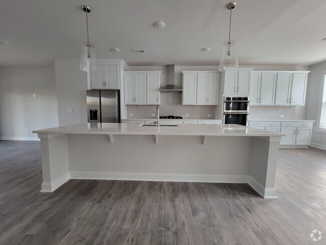 Building Photo - Beautiful Townhome with 3 bedrooms, three ...