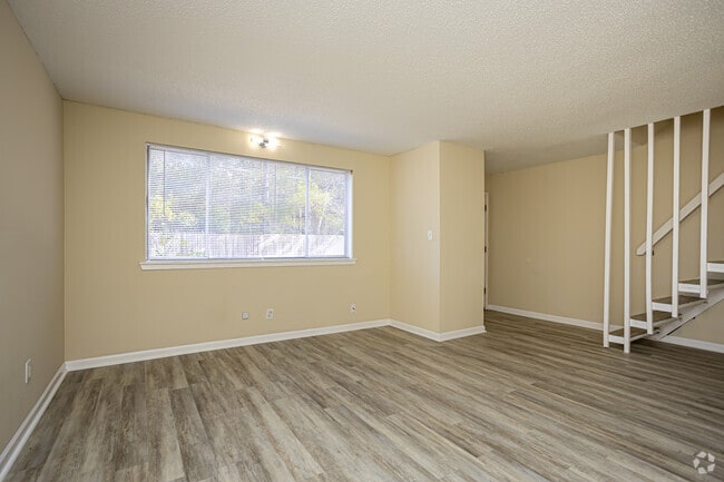 3BR, 2BA Townhouse - 1,100SF - Living Room - Forestwood Apartments
