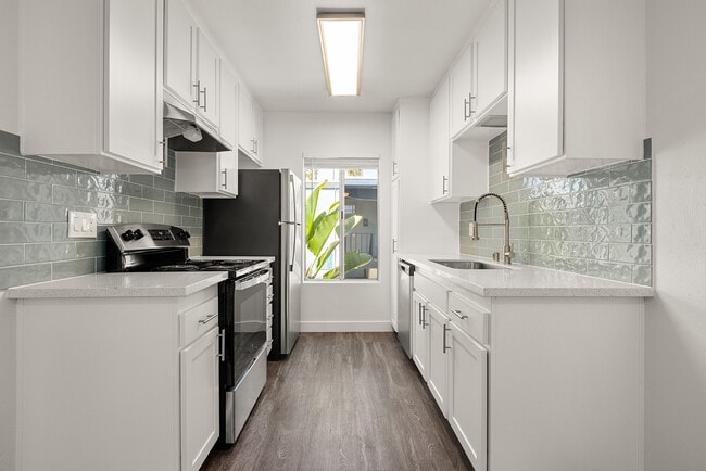 Cook, dine, and gather in a stylish kitchen space.