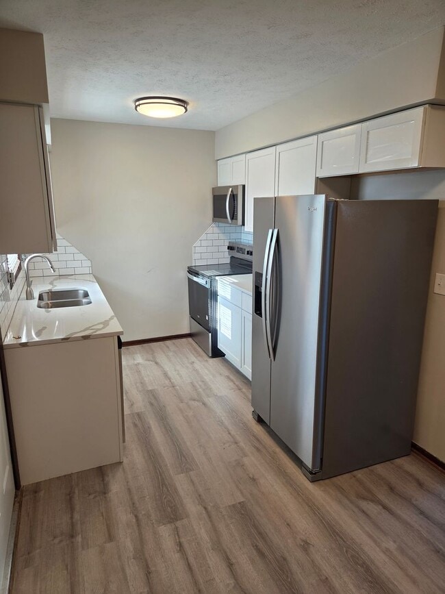 Photo - 4/2/1 Newly remodeled with fenced in backyard!!!