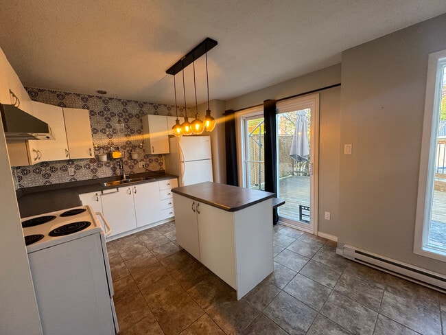 Photo - Spacious 7 Bedroom, 2.5 Bathroom Home