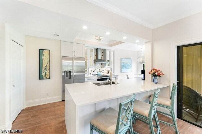 Photo - 6770 Pelican Bay Blvd Unit 242