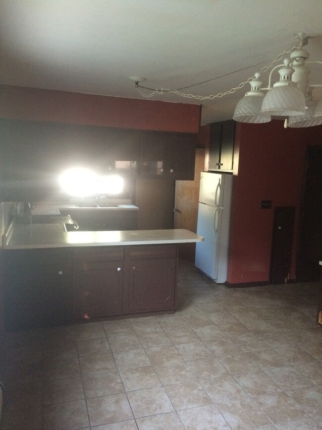 Building Photo - 1110 5th St SW Unit 1 Front