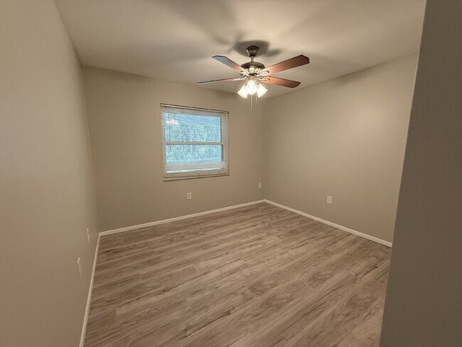 Photo - "Charming 3-Bed Oasis with 2 Full Baths in New Port Richey – Your Perfect Retreat Awaits!"