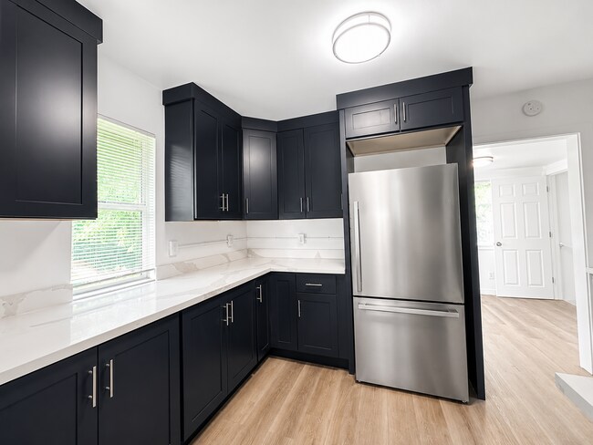 Photo - Fully Remodeled 4-Bedroom, 3-Bath Home with Garage and Private Fenced Yard – North Seattle