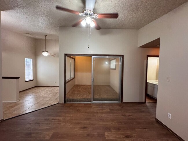 Photo - 2 bed duplex with 1 1/2 baths, bonus room and a 1 car garage for lease in SW OKC! (no fenced yard)