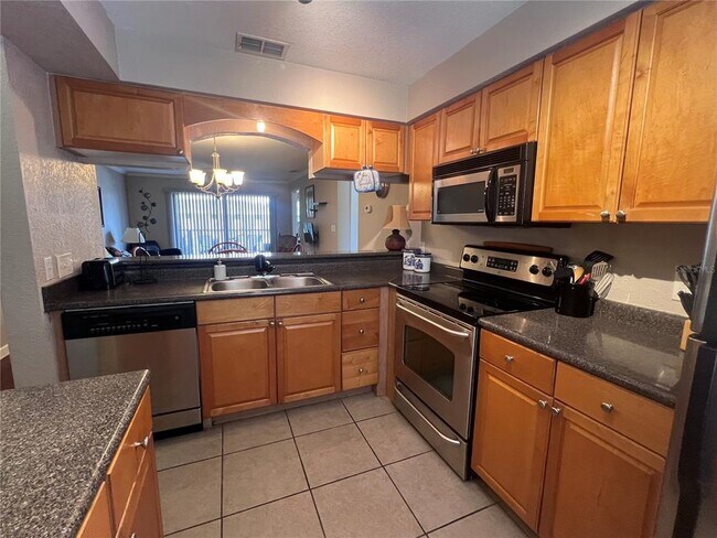 Photo - 10177 Sailwinds Blvd S Unit 202