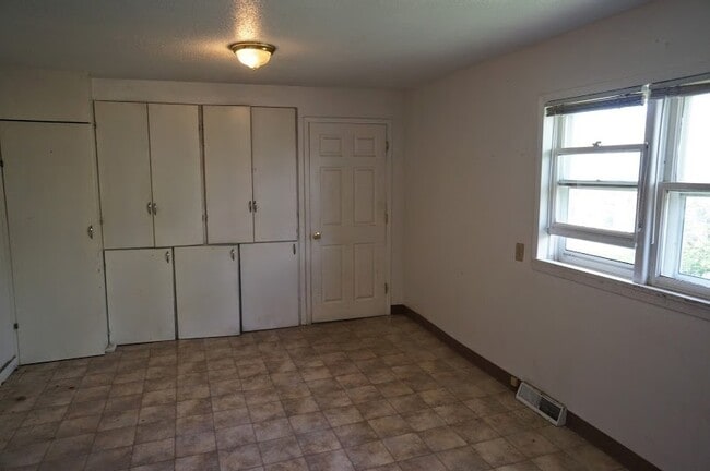Photo - AVAILABLE JUNE 1ST 2026 - 4 bed, 2 bath home available!