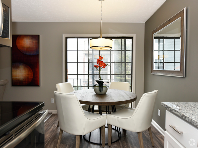 Dining Room + Hardwood Style Flooring - The Monarch Rental