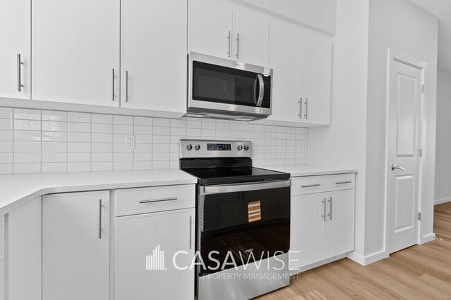Photo - 21039-21025 25 Ave NW