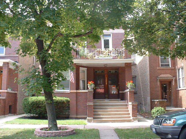 Beautiful brown stoned 2-flat building. - 3650 N Oakley Ave Unit 2F
