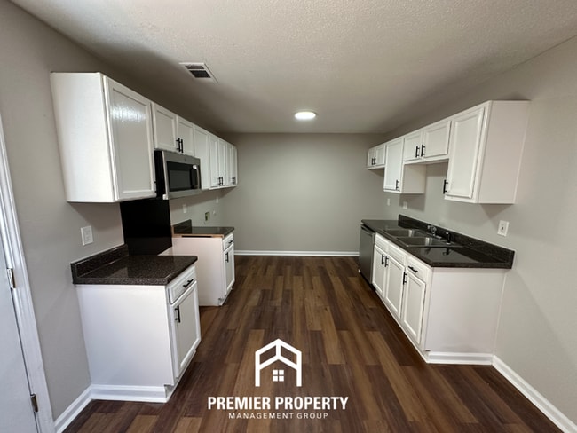 Photo - Spacious 4BR/2BA Home in 38141 | Vinyl Flooring & Large Fenced Backyard