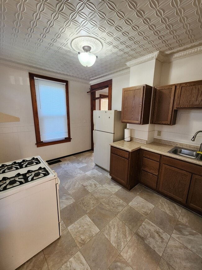 Large Eat-In Kitchen with Original Tin Ceiling - 2548 Jackson St Unit 1