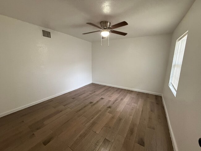Photo - Updated 3BR w/ Hardwood Floors, Walk-In Shower & Stainless Steel Kitchen