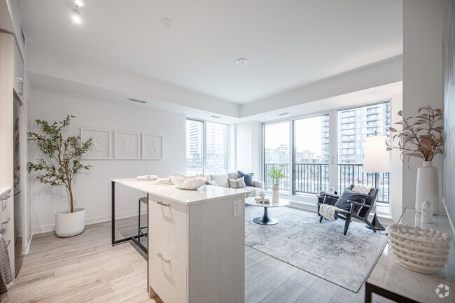 2BR, 2BA - 902SF - Kitchen & Living Room