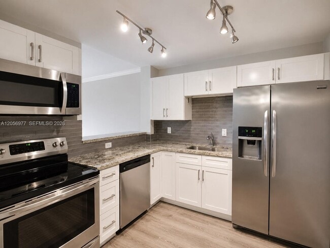 Building Photo - 1881 Middle River Dr Unit 604