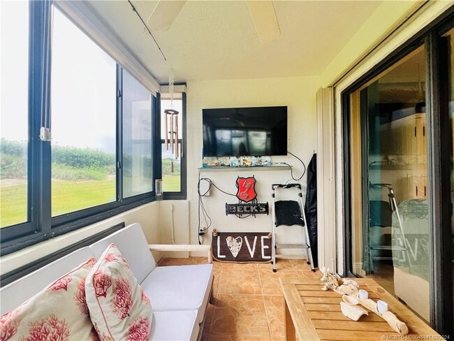 Building Photo - 10044 S Ocean Dr Unit 102