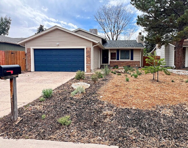 Building Photo - Charming Aurora Retreat with Gardener's Paradise Backyard - Pet Friendly