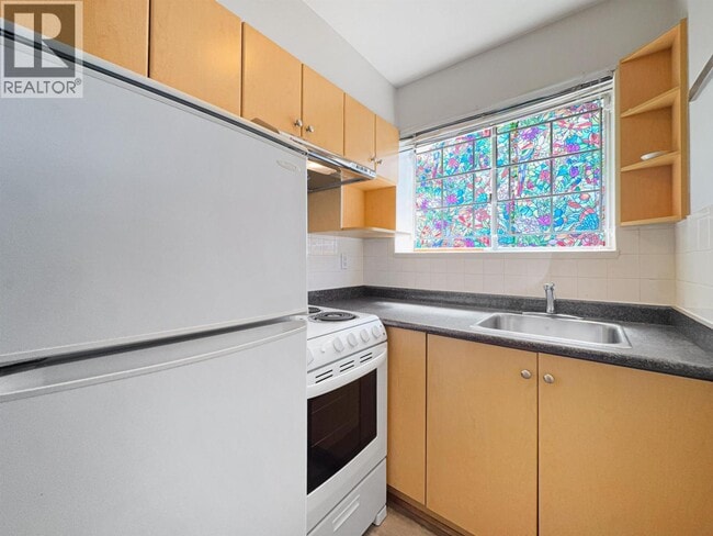 Photo - 8635 Fremlin St Unit 1xx