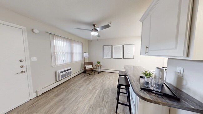 Our open living concept features a breakfast bar overlooking the living area for a seamlessly blended space for optimal studio living.