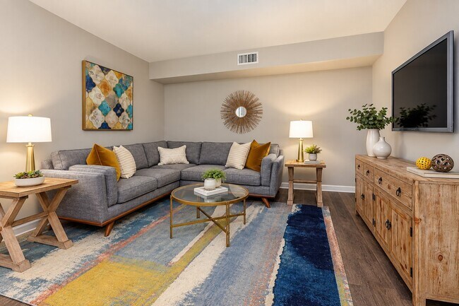 Step into the inviting living space at Manatee Bay, where comfort meets style. The modern decor and cozy ambiance create the perfect backdrop for relaxation. Explore your new home today for a lifestyle you’ll love!