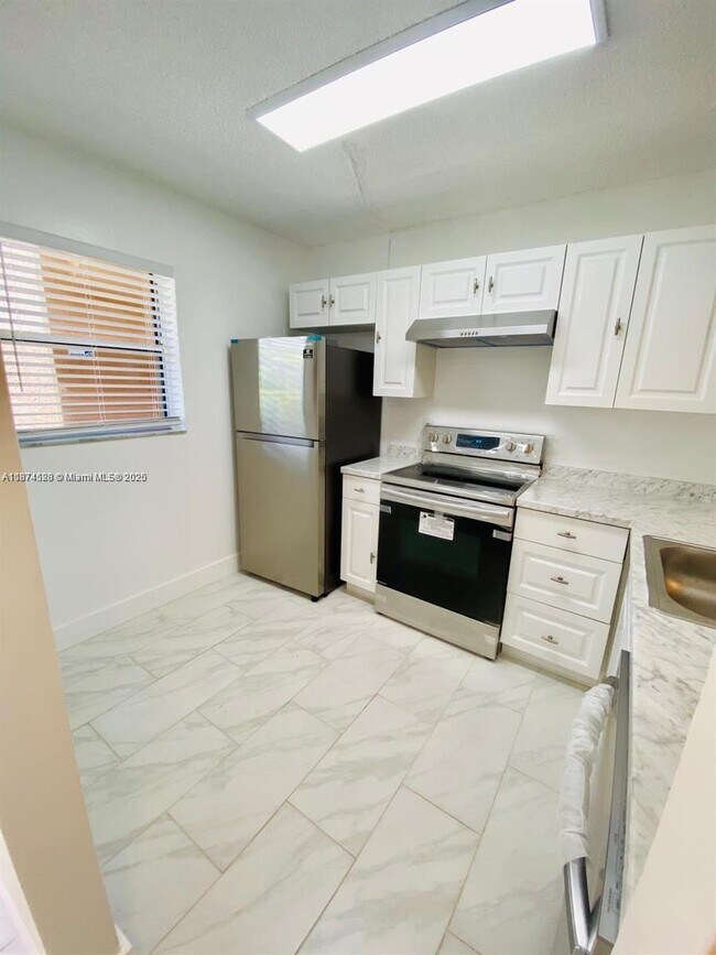 Building Photo - 10310 NW 8th St Unit 102 Rental