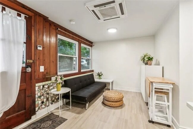 Photo - 5830 S Robertson St Unit 5830 Apt A Rear