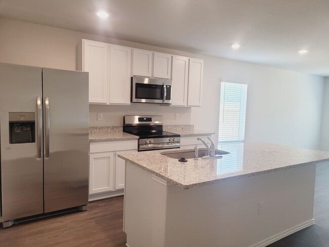 Photo - "Like New" 1-story | 4 bedroom | 2 bath home on quiet cul-de-sac with no neighbors behind in tran...