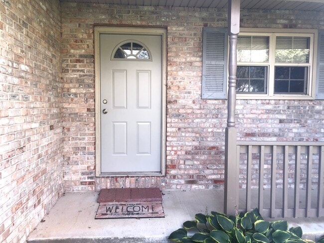 Front entrance with porch - 6223 Cross Bend Ct Townhome