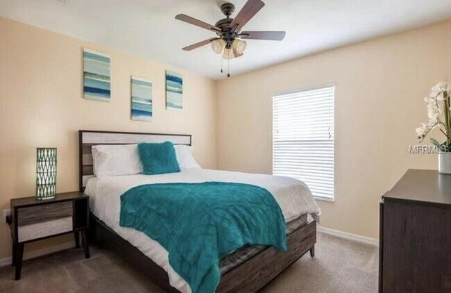 Photo - 2 Community Pools • 3-Bed Townhome • Gated Community • Modern Kitchen • Prime New Tampa Location
