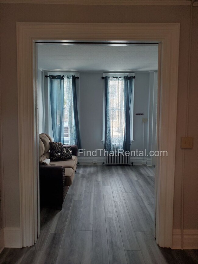 Photo - Charming Historic Retreat with Private Fenced Yard & Parking – Prime Downtown Location