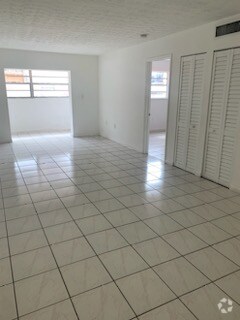 Building Photo - 6055 W 19th Ave Unit 218 Rental