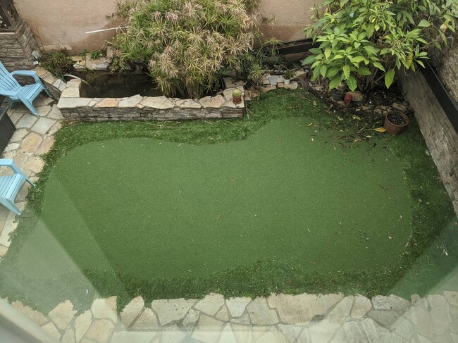 Patio trasero- Renovación del estanque para convertirlo en jardinera - 1813 Oliver Ave