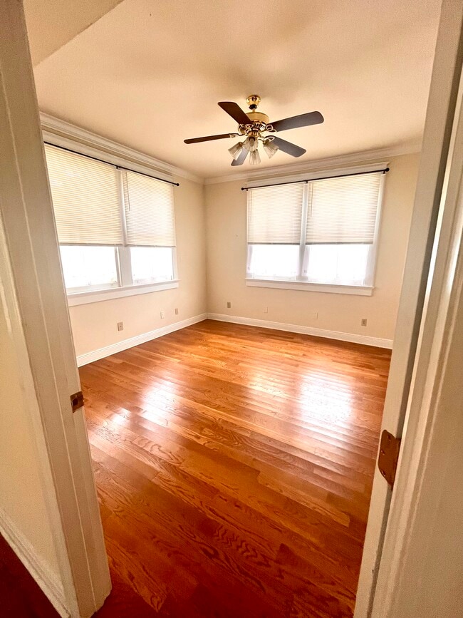 Bedroom 1 (includes walk-in closet); pic is of downstairs unit but identical layout - 2900 Palmer Ave Unit 2902