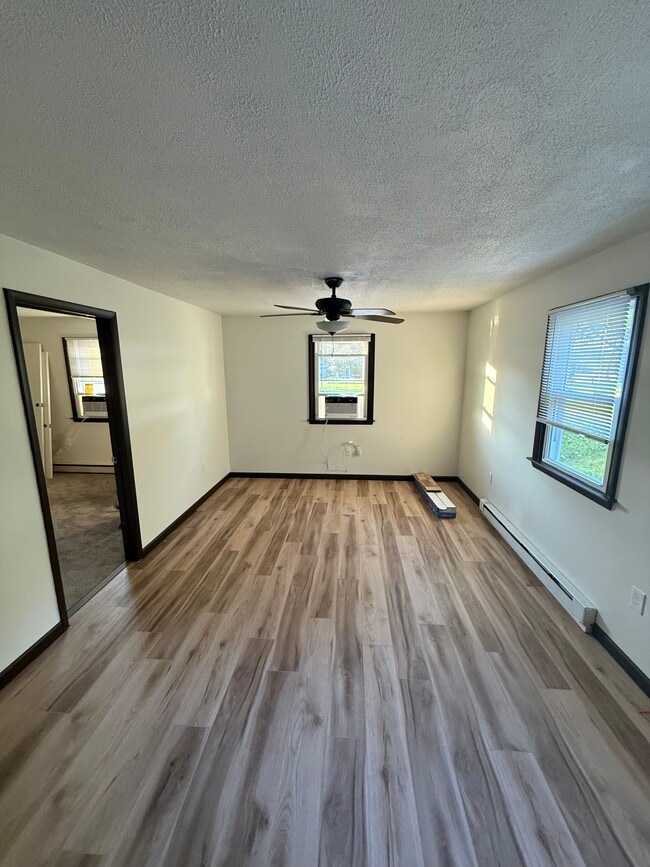 Main entrance to the right. Viewing the living room. - 6820 Rowe Dr Unit 6820