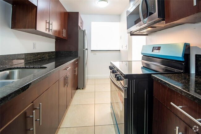 Building Photo - 4147 Stirling Rd Unit 306 Rental