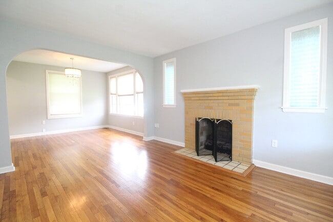 Photo - Charming East Hill 3BR Cottage – Hardwood Floors Throughout, Granite Kitchen with Gas Stove, Bric...