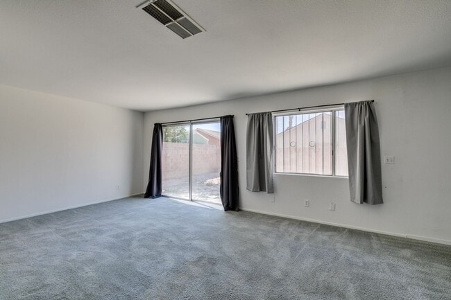 Photo - Double Primary Townhome with Spacious Backyard in 89115!