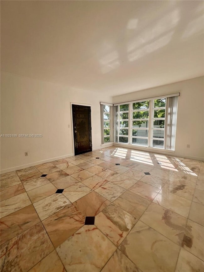 Building Photo - 9350 E Bay Harbor Dr Unit 6