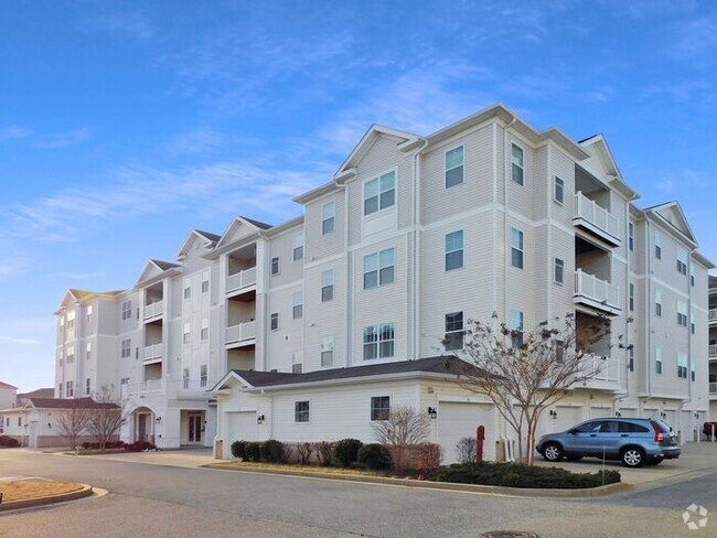 Building Photo - Pet Friendly Condo with Deck and 1 Car Garage