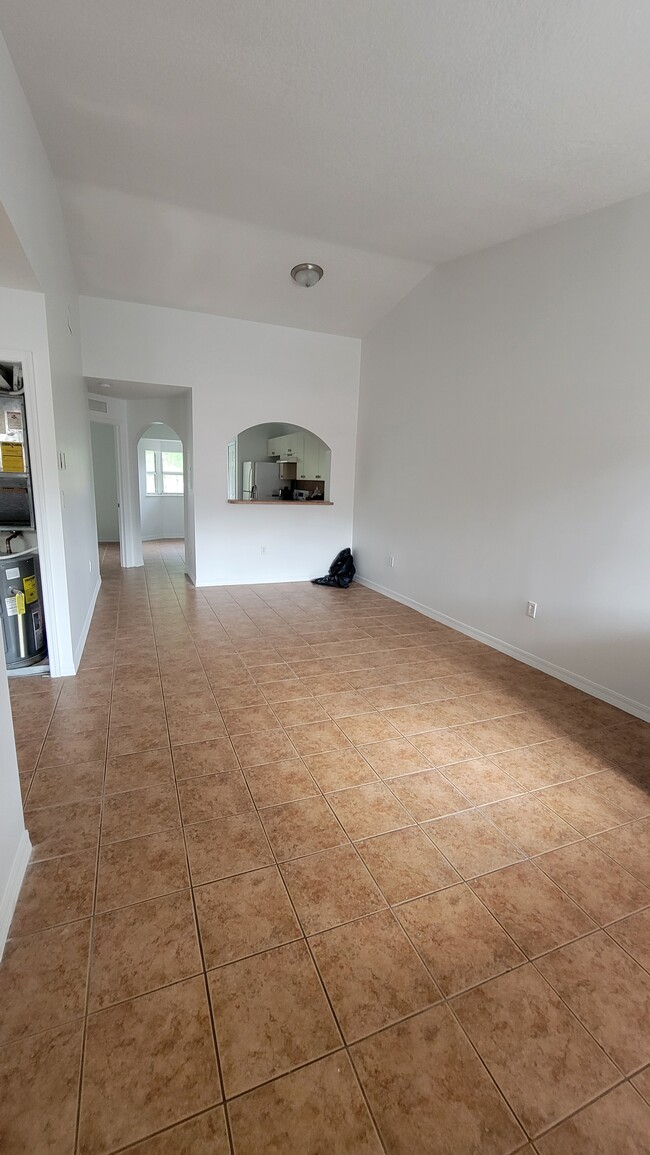 Living/dining room from Front Door - 1261 SE 28th Ct Apartment Unit 204