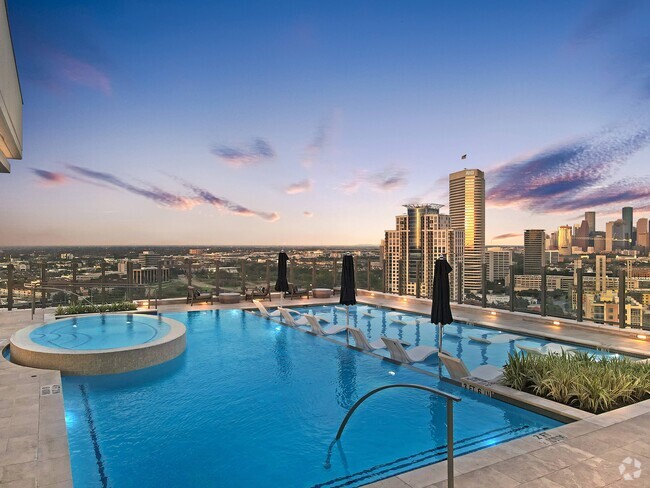 Rooftop pool offering impressive downton views - Hanover Autry Park Rental